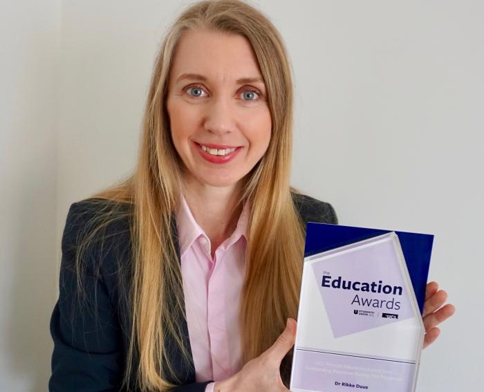 Dr Rikke Duus holding her UCL Education Award